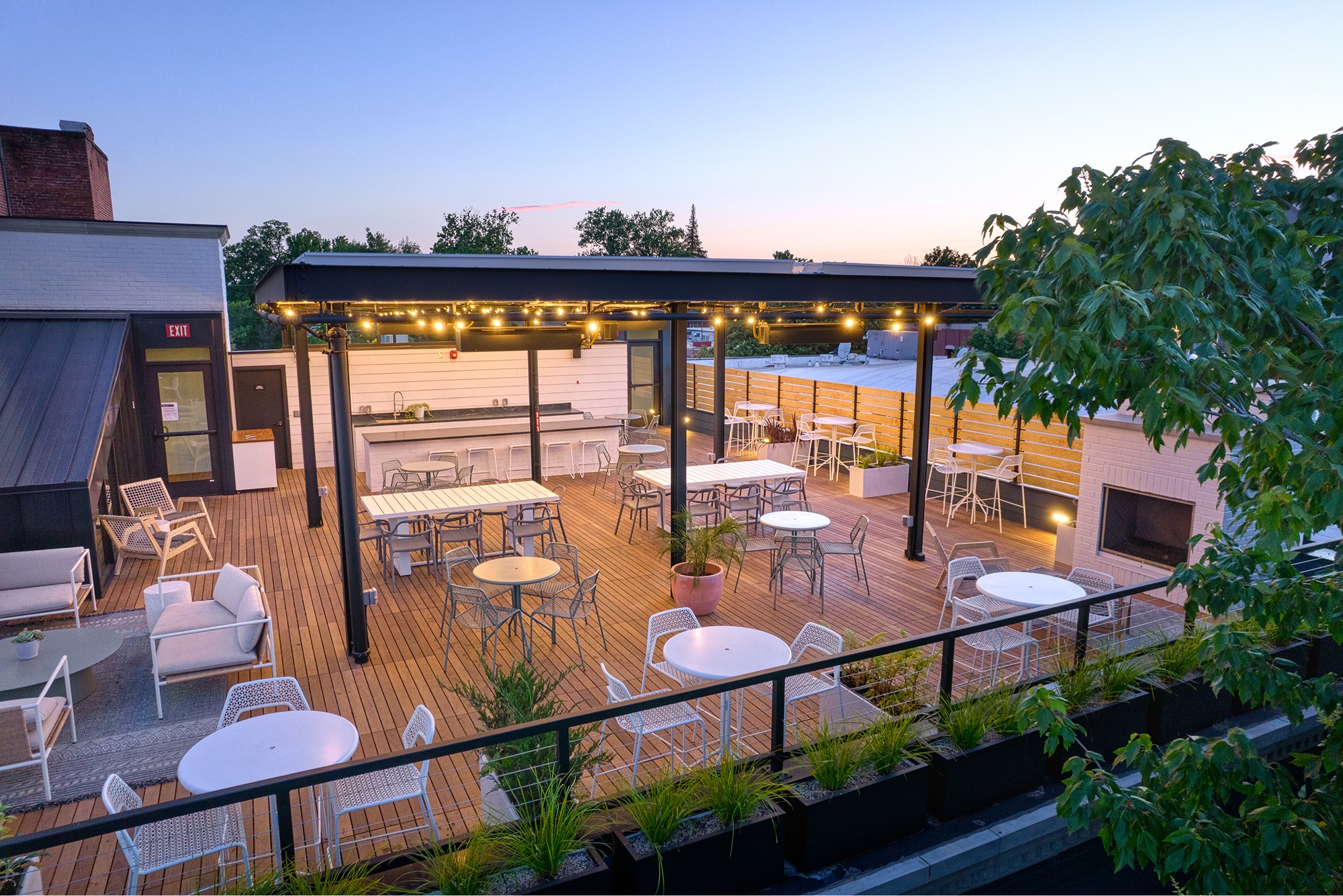 New rooftop deck in downtown Chico with string lights and wood decking