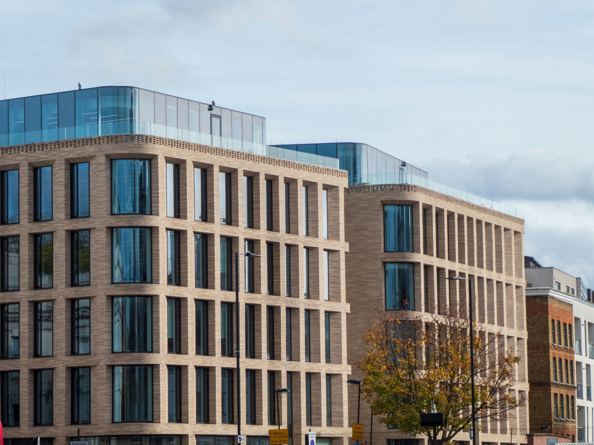 Large commercial building with rows of windows